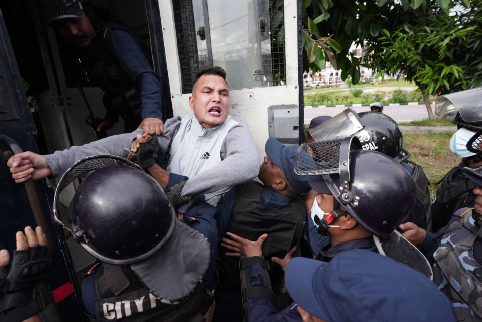 Two Youths Arrested for Sloganeering at Maitighar; Dr. Bhusal Absent Amid Tight Security