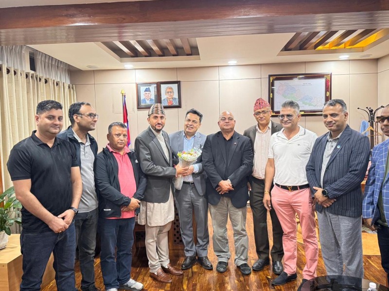 NRNA President Meets Minister Jagdish Kharel