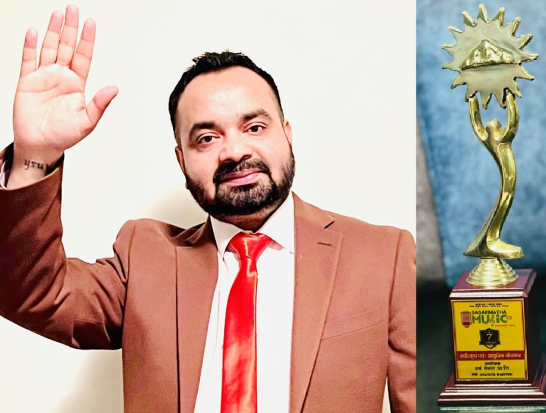 Lyricist Dr. Ramil Adhikari honored with 7th Sagarmatha Music Award