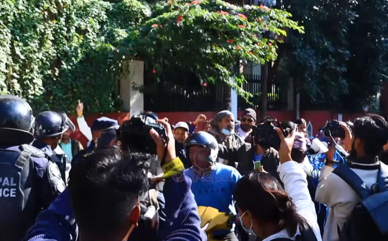 Durga, who was taken to court in handcuffs, kept smiling, while a large number of his supporters created chaos